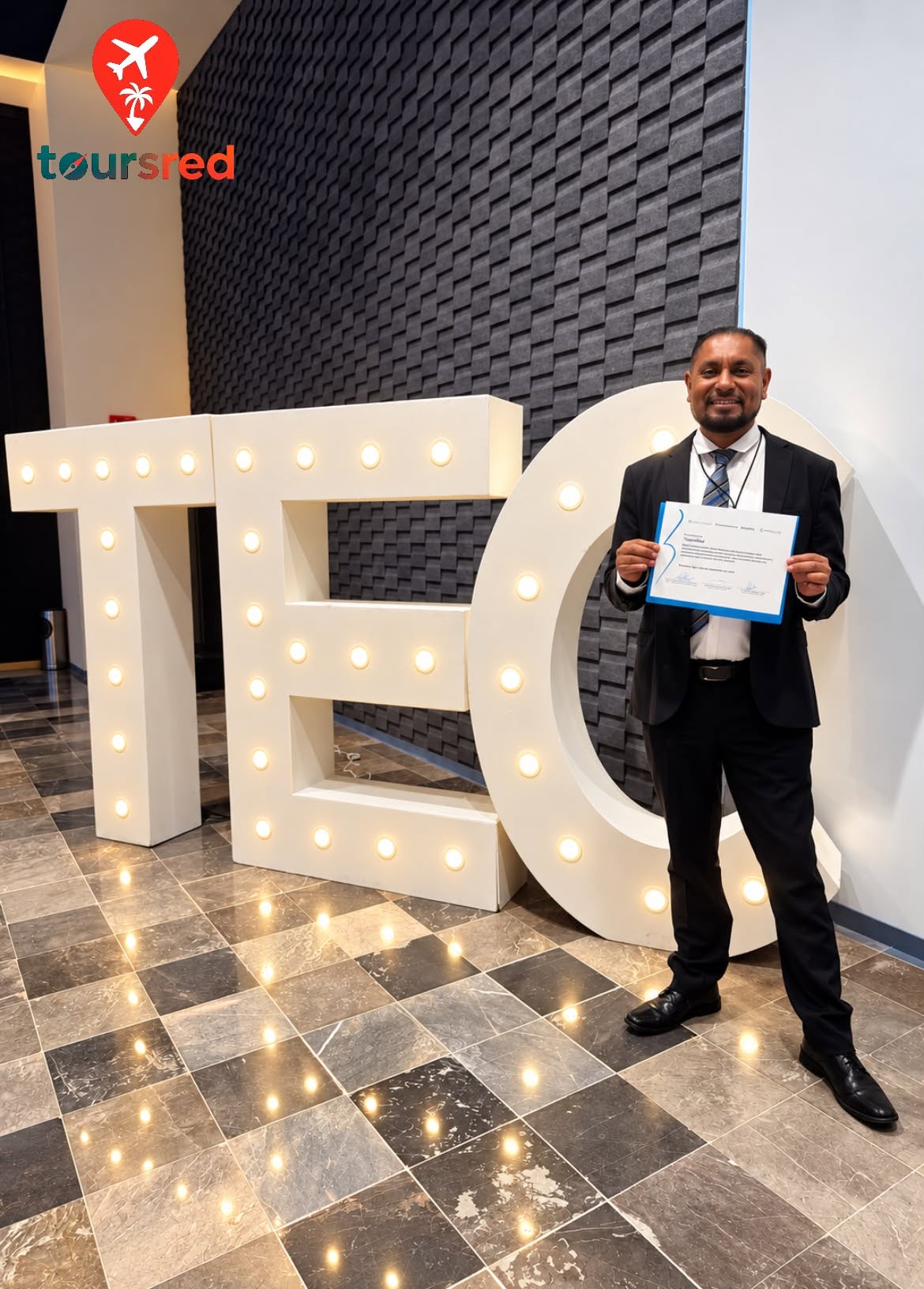 ToursRed representative holding the participation recognition at the Tecnológico de Monterrey